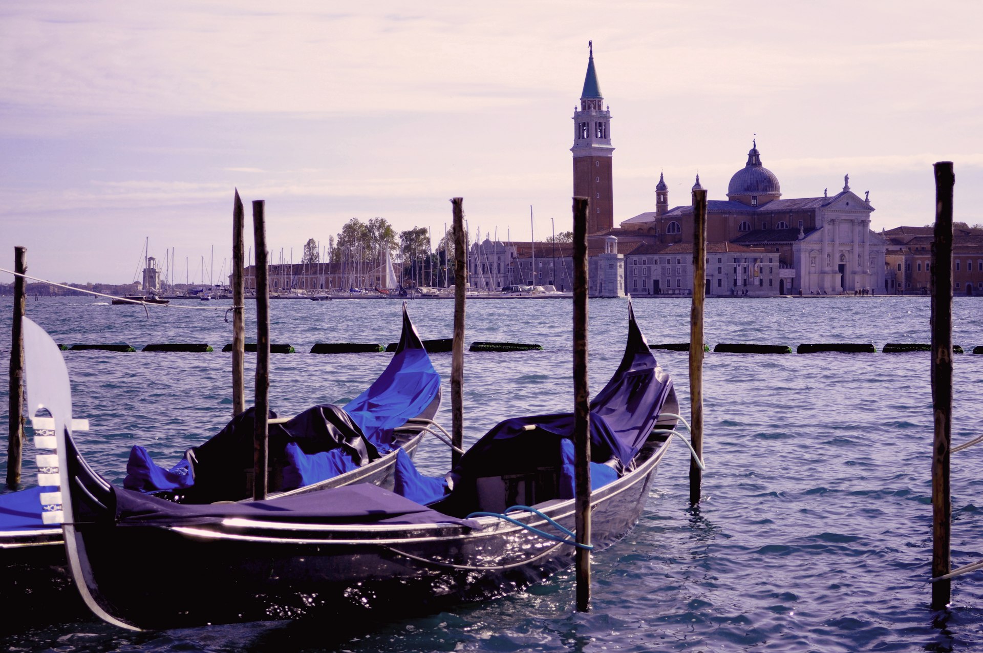 two gondola boats in a sea dock